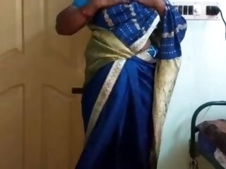 desi north indian mischievous cuckold wife vanitha wearing blue colour saree flashing big bosoms and clean-shaved pussy press