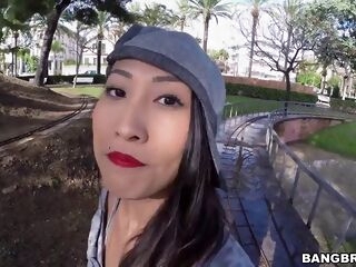 attractive asian babe with big tits getting her ass pummeled outdoors