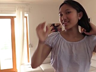 Petite Asian stunner toys her clean-shaved fuckbox solo