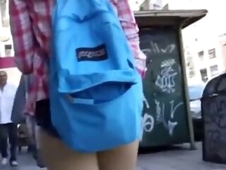 youthful teen showcasing ass in brief cut-offs public walking