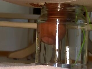 Tiny lil' shrinkled prick finishes off in jar with water
